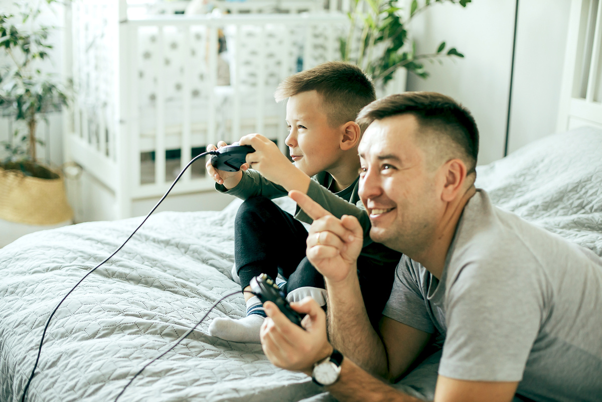 Father and Son Playing Video Games 